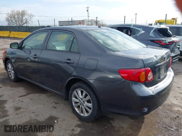 2009 Toyota Corolla with VIN 1NXBU40E79Z042778, listed as a IAAI auction lot 41928062 with 201,409 mi miles. Bid and sale history available at carsss.com. Image 3.