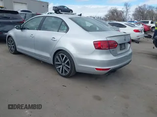2014 Volkswagen Jetta GLI Edition 30 с VIN 3VW4S7AJ2EM214517, выставлен на аукционе IAAI как лот 41662860 с пробегом 185 783 миль миль и . История ставок и продаж доступна на DreamBid. Изображение 3.