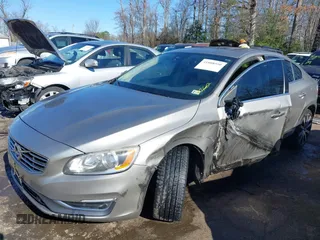 2016 Volvo S60 T5 Premier z VIN LYV612TK2GB099241, wystawiony jako IAAI lot #41808950 z przebiegiem 153 693 mil mil oraz . Historia ofert i sprzedaży dostępna na DreamBid. Obrazek 6.