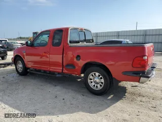2002 Ford F-150 XL with VIN 2FTRX07WX2CA98348, listed as a Copart auction lot 43705135 with 204,718 mi miles and Salvage Title. Bid and sale history available at carsss.com. Image 2.