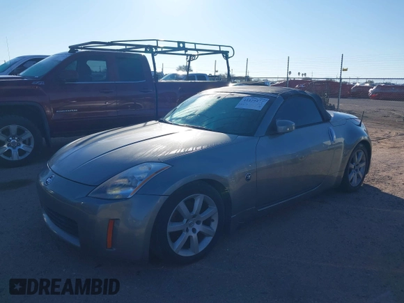 2005 Nissan 350Z Touring z VIN JN1AZ36A25M754869, wystawiony jako IAAI lot #41429477 z przebiegiem 110 896 mil mil oraz . Historia ofert i sprzedaży dostępna na DreamBid. Obrazek 2.