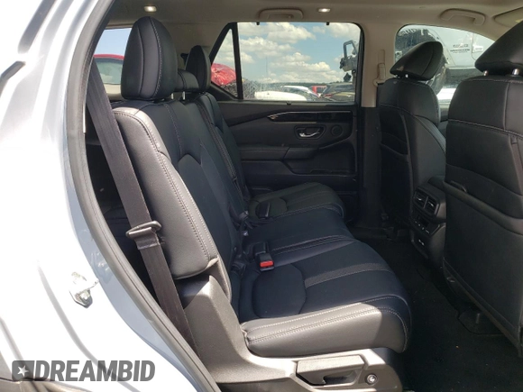 2023 Honda Pilot Touring with VIN 5FNYG2H78PB006054, listed as a Copart auction lot 56039785 with 35,831 mi miles and Salvage title. Bid and sale history available at DreamBid. Image 11.