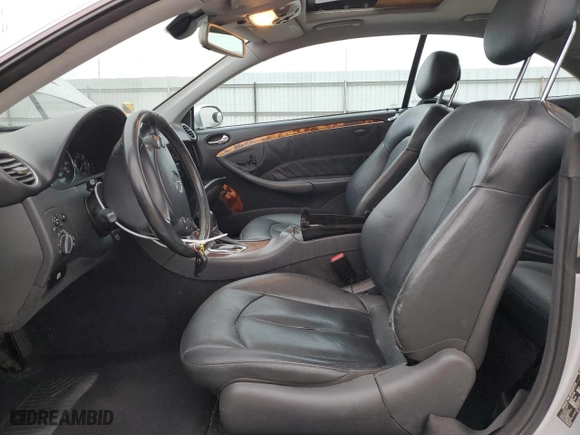 2004 Mercedes-Benz CLK-Class 5.0L with VIN WDBTJ75J04F110990, listed as a Copart auction lot 85511414 with 251,096 mi miles and Salvage Title. Bid and sale history available at carsss.com. Image 7.