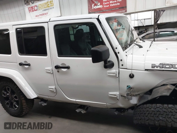 2017 Jeep Wrangler Unlimited Sahara with VIN 1C4BJWEG2HL700840, listed as a IAAI auction lot 42631036 with 60,610 mi miles and . Bid and sale history available at DreamBid. Image 13.
