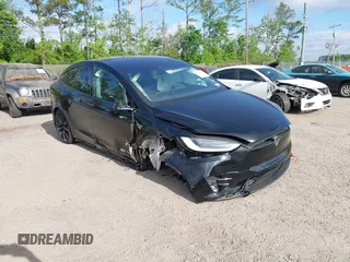 2016 Tesla Model X 70D z VIN 5YJXCAE29GF003478, wystawiony jako IAAI lot #41965737 z przebiegiem 105 930 mil mil oraz . Historia ofert i sprzedaży dostępna na DreamBid. Obrazek 1.