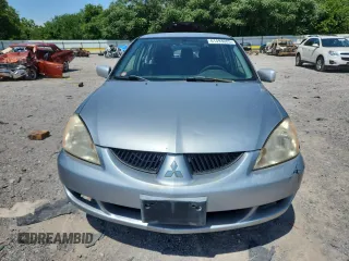 2004 Mitsubishi Lancer z VIN JA3AD29F34U045488, wystawiony jako Copart lot #61493005 z przebiegiem 230 611 mil mil oraz Czysty tytuł • Clean title. Historia ofert i sprzedaży dostępna na DreamBid. Obrazek 5.