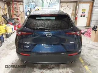 2022 Mazda CX-30 S Select z VIN 3MVDMBBL0NM440747, wystawiony jako IAAI lot #41864038 z przebiegiem 9667 mil mil oraz . Historia ofert i sprzedaży dostępna na DreamBid. Obrazek 16.