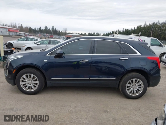 2017 Cadillac XT5 FWD with VIN 1GYKNARS2HZ188557, listed as a IAAI auction lot 41840764 with 104,524 mi miles. Bid and sale history available at carsss.com. Image 14.