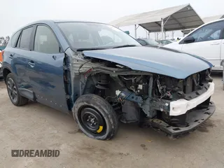 2016 Mazda CX-5 Grand Touring with VIN JM3KE2DY7G0875678, listed as a IAAI auction lot 42104888 with 30,566 mi miles. Bid and sale history available at carsss.com. Image 1.