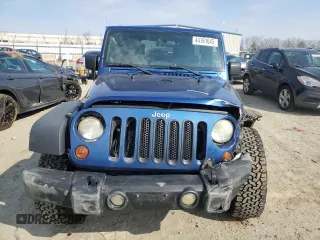2009 Jeep Wrangler Unlimited Rubicon z VIN 1J4GA69179L763259, wystawiony jako Copart lot #44161645 z przebiegiem 153 146 mil mil oraz Szkoda całkowita • Salvage title. Historia ofert i sprzedaży dostępna na DreamBid. Obrazek 5.