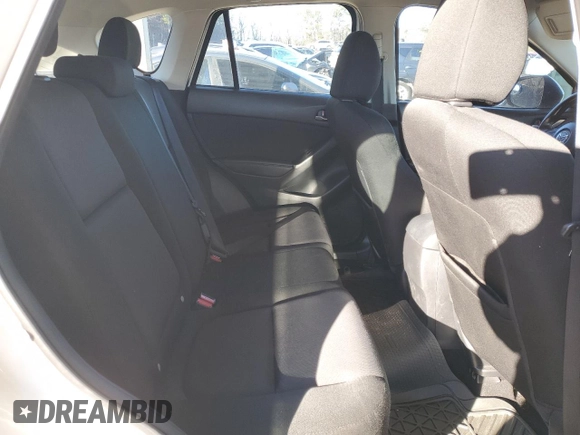 2014 Mazda CX-5 Sport with VIN JM3KE2BEXE0332590, listed as a Copart auction lot 87534365 with Not Provided miles and Salvage Title. Bid and sale history available at carsss.com. Image 10.