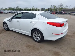 2014 Kia Optima LX with VIN 5XXGM4A72EG260072, listed as a IAAI auction lot 42109844 with 167,910 mi miles and . Bid and sale history available at carsss.com. Image 3.