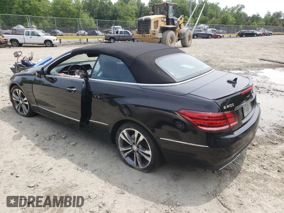 2015 Mercedes-Benz E 400 with VIN WDDKK6FFXFF295735, listed as a Copart auction lot 52134483 with 36,835 mi miles and Salvage title. Bid and sale history available at DreamBid. Image 2.