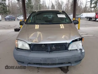 2001 Toyota Sienna CE with VIN 4T3ZF19C31U393059, listed as a IAAI auction lot 41809583 with 237,250 mi miles. Bid and sale history available at carsss.com. Image 12.