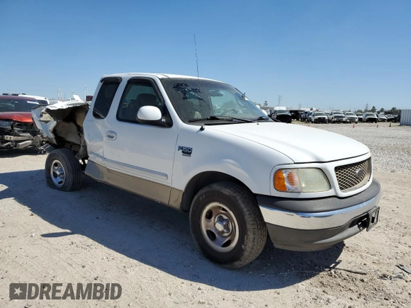2002 Ford F-150 XL with VIN 1FTRX17W82NA64876, listed as a Copart auction lot 50013045 with 256,345 mi miles and Salvage Title. Bid and sale history available at carsss.com. Image 4.