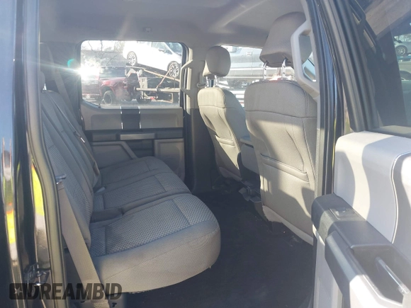 2015 Ford F-150 XLT with VIN 1FTEW1E86FFC00959, listed as a IAAI auction lot 41581711 with 130,298 mi miles. Bid and sale history available at carsss.com. Image 8.