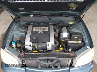 2005 Hyundai XG with VIN KMHFU45E35A414283, listed as a IAAI auction lot 42211359 with 101,869 mi miles. Bid and sale history available at carsss.com. Image 10.