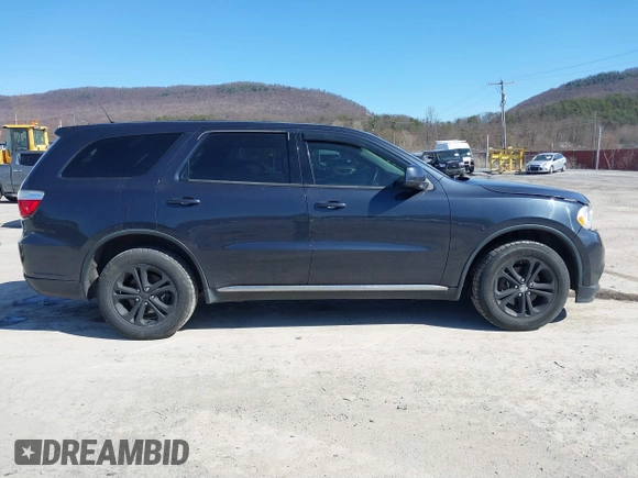 2013 Dodge Durango SXT with VIN 1C4RDJAG2DC530407, listed as a IAAI auction lot 41837441 with 133,375 mi miles and . Bid and sale history available at DreamBid. Image 13.