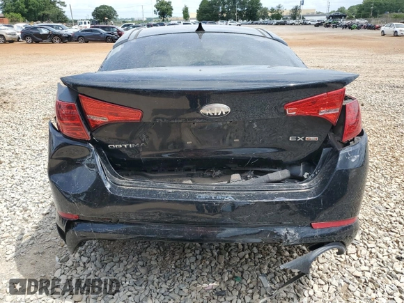 2013 Kia Optima EX с VIN 5XXGN4A76DG246591, выставлен на аукционе Copart как лот 60995845 с пробегом 179 314 миль миль и Списание • Salvage title. История ставок и продаж доступна на DreamBid. Изображение 6.