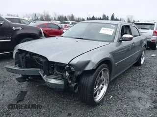 2006 Chrysler 300 C with VIN 2C3KA63H06H286676, listed as a IAAI auction lot 41231230 with 134,565 mi miles. Bid and sale history available at carsss.com. Image 17.