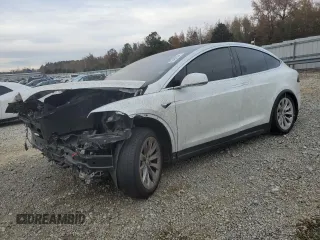 2020 Tesla Model X Long Range with VIN 5YJXCDE24LF250807, listed as a Copart auction lot 83469534 with 71,318 mi miles and Salvage Title. Bid and sale history available at carsss.com. Image 1.