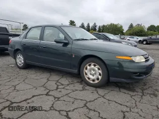 2001 Saturn LS z VIN 1G8JU54F41Y581083, wystawiony jako Copart lot #73123714 z przebiegiem 98 500 mil mil oraz Szkody całkowita. Historia ofert i sprzedaży dostępna na DreamBid. Obrazek 4.