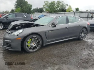 2016 Porsche Panamera S E-Hybrid z VIN WP0AD2A77GL040200, wystawiony jako Copart lot #56223035 z przebiegiem 113 659 mil mil oraz Szkody całkowita. Historia ofert i sprzedaży dostępna na DreamBid. Obrazek 1.