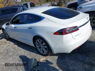 2016 Tesla Model S 70 with VIN 5YJSA1E16GF164264, listed as a IAAI auction lot 40976293 with 68,940 mi miles and . Bid and sale history available at DreamBid. Image 3.
