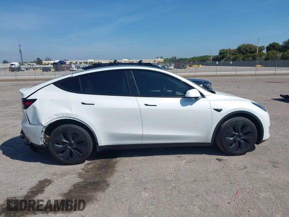 2024 Tesla Model Y with VIN 7SAYGDED9RF161420, listed as a IAAI auction lot 41892788 with 12,353 mi miles and . Bid and sale history available at DreamBid. Image 13.