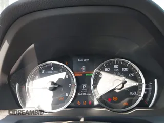 2019 Acura TLX with VIN 19UUB1F3XKA009385, listed as a IAAI auction lot 40584274 with 61,376 mi miles. Bid and sale history available at carsss.com. Image 7.