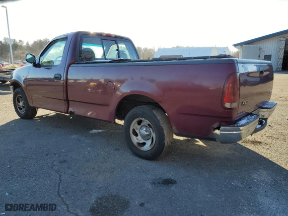 1997 Ford F-150 Standard with VIN 1FTDF1721VNA54544, listed as a Copart auction lot 85661394 with 221,536 mi miles and Salvage Title. Bid and sale history available at carsss.com. Image 2.