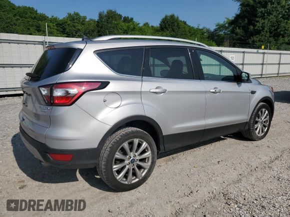 2018 Ford Escape Titanium z VIN 1FMCU0J95JUD44086, wystawiony jako Copart lot #58978865 z przebiegiem 90 874 mil mil oraz Szkoda całkowita • Salvage title. Historia ofert i sprzedaży dostępna na DreamBid. Obrazek 3.