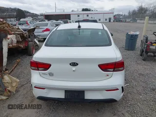 2021 Kia Rio LX with VIN 3KPA24AD3ME400283, listed as a IAAI auction lot 41495331 with 84,920 mi miles. Bid and sale history available at carsss.com. Image 16.