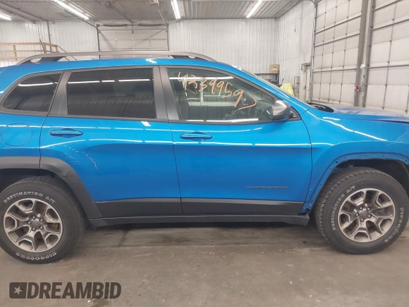 2020 Jeep Cherokee Trailhawk with VIN 1C4PJMBX6LD656570, listed as a IAAI auction lot 42399597 with 88,348 mi miles and . Bid and sale history available at DreamBid. Image 14.