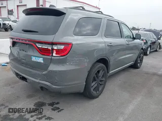 2023 Dodge Durango GT Plus with VIN 1C4RDHDG8PC551884, listed as a IAAI auction lot 42033893 with 43,370 mi miles and . Bid and sale history available at DreamBid. Image 4.