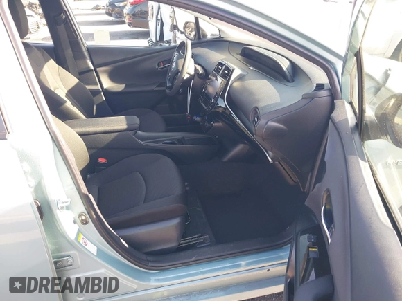2022 Toyota Prius L Eco with VIN JTDKAMFU8N3188831, listed as a IAAI auction lot 42021222 with 39,629 mi miles and . Bid and sale history available at DreamBid. Image 5.