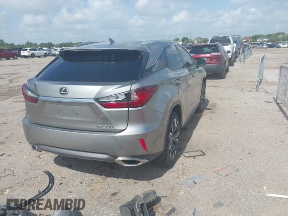 2019 Lexus RX 350 z VIN 2T2ZZMCA3KC123630, wystawiony jako IAAI lot #42436711 z przebiegiem 63 989 mil mil oraz . Historia ofert i sprzedaży dostępna na DreamBid. Obrazek 4.