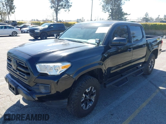 2018 Toyota Tacoma SR with VIN 3TMCZ5AN2JM127244, listed as a IAAI auction lot 41698199 with 61,535 mi miles and . Bid and sale history available at DreamBid. Image 17.