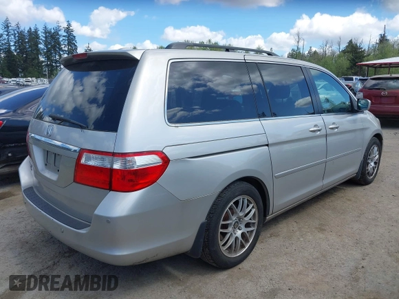 2006 Honda Odyssey TOURING with VIN 5FNRL38806B000049, listed as a IAAI auction lot 42095336 with 218,584 mi miles. Bid and sale history available at carsss.com. Image 4.
