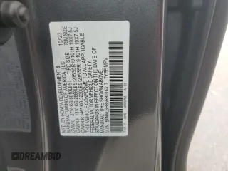 2024 Honda Odyssey Touring z VIN 5FNRL6H85RB016317, wystawiony jako Copart lot #59483565 z przebiegiem 17 351 mil mil oraz Nie do naprawy • Non repairable. Historia ofert i sprzedaży dostępna na DreamBid. Obrazek 14.