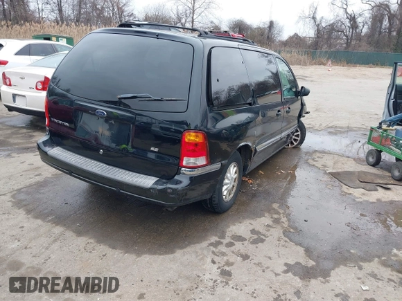 1999 Ford Windstar SE with VIN 2FMDA5243XBC41132, listed as a IAAI auction lot 41575559 with 240,497 mi miles and . Bid and sale history available at carsss.com. Image 4.