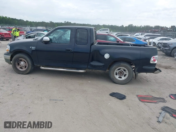 2000 Ford F-150 XL with VIN 1FTRX07W9YKB27455, listed as a IAAI auction lot 42197973 with 211,160 mi miles and . Bid and sale history available at DreamBid. Image 14.