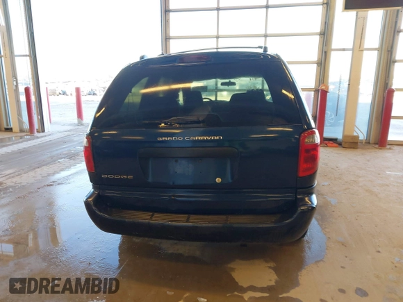 2003 Dodge Grand Caravan with VIN 2D4GP24353R195035, listed as a IAAI auction lot 41574068 with 209,165 mi miles and . Bid and sale history available at DreamBid. Image 13.