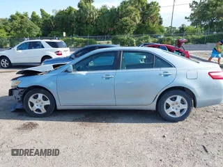2007 Toyota Camry CE z VIN 4T1BE46K97U714024, wystawiony jako IAAI lot #42416410 z przebiegiem 218 500 mil mil oraz . Historia ofert i sprzedaży dostępna na DreamBid. Obrazek 14.