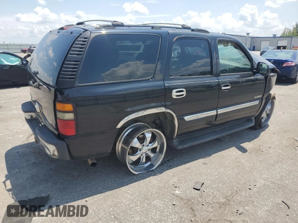 2005 GMC Yukon SLE with VIN 1GKEC13T35R233595, listed as a Copart auction lot 64571554 with 0 mi miles and Salvage Title. Bid and sale history available at carsss.com. Image 3.