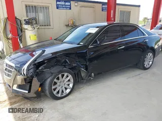 2014 Cadillac CTS RWD with VIN 1G6AP5SX4E0149156, listed as a IAAI auction lot 42681914 with 49,539 mi miles and . Bid and sale history available at DreamBid. Image 17.