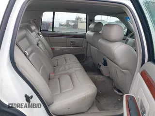1999 Cadillac DeVille z VIN 1G6KD54Y5XU768072, wystawiony jako IAAI lot #41777526 z przebiegiem 88 662 mil mil oraz . Historia ofert i sprzedaży dostępna na DreamBid. Obrazek 8.