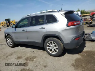 2016 Jeep Cherokee Latitude with VIN 1C4PJMCS9GW215870, listed as a Copart auction lot 57992675 with 212,594 mi miles and Salvage title. Bid and sale history available at DreamBid. Image 2.
