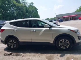 2015 Hyundai Santa Fe z VIN 5XYZTDLB3FG298677, wystawiony jako IAAI lot #42436155 z przebiegiem 118 181 mil mil oraz . Historia ofert i sprzedaży dostępna na DreamBid. Obrazek 13.