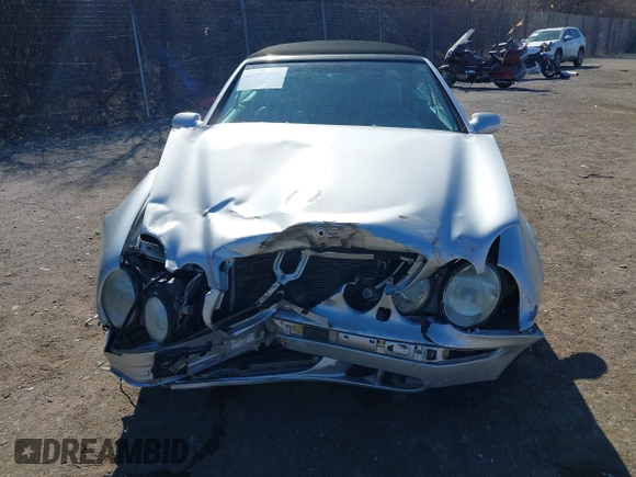 2003 Mercedes-Benz CLK 320 z VIN WDBLK65GX3T143863, wystawiony jako IAAI lot #41704225 z przebiegiem Nie podano mil oraz . Historia ofert i sprzedaży dostępna na DreamBid. Obrazek 13.